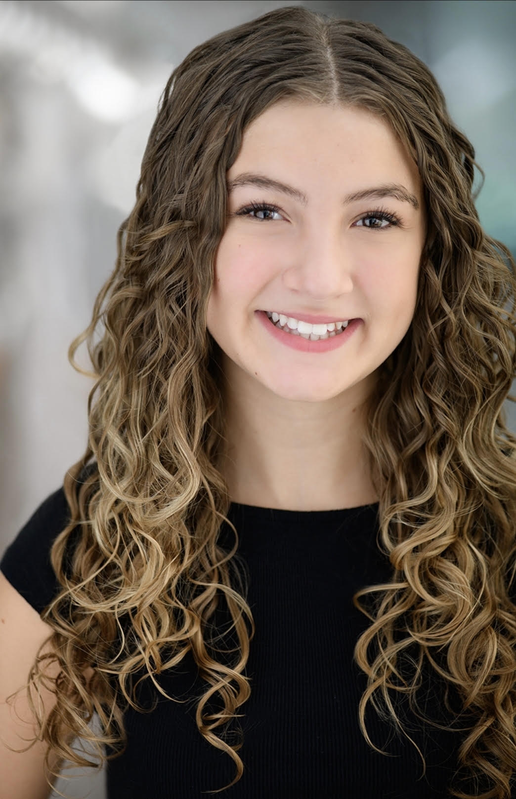 Professional headshot of Ashlyn Vargas Ward